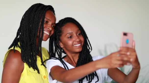 Black African Mother Teen Girl Taking Selfie Together — Video