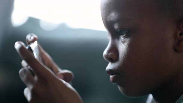 African Boy Playing Video Game Smartphone Device Child Plays Game — Vídeo de Stock