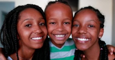African american siblings, brother and sisters children face close-up