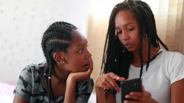 Girls Gossiping Social Media Covering Face Mouth Black African Sisters — Wideo stockowe