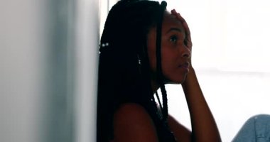 Pensive African black woman in desperate times