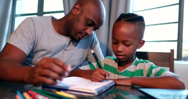 African American Father Tutoring Little Boy Son — Vídeo de stock
