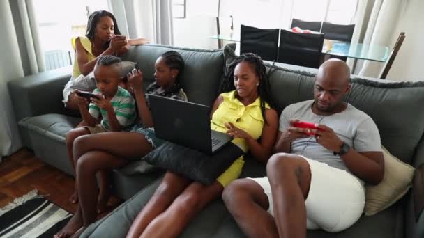 Black African American Family Home Using Tech Devices — Video