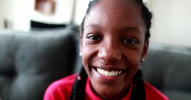 Happy teen black african girl smiling
