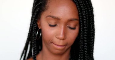 Mixed race teenager girl portrait face looking at camera. African black ethnicity young woman
