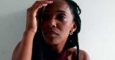 Worried black woman feeling anguish. anxious African female