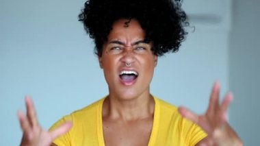 Black woman yelling to sky, african person shouting looking up