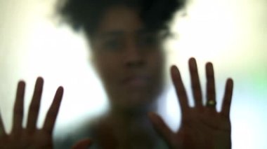 Woman feeling trapped behind glass, depression mental illness concept