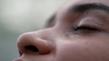 Black person close-up eyes opening eyes looking up