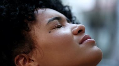 Black woman squinting eyes