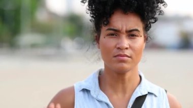 Black African woman expressing NO with her hand