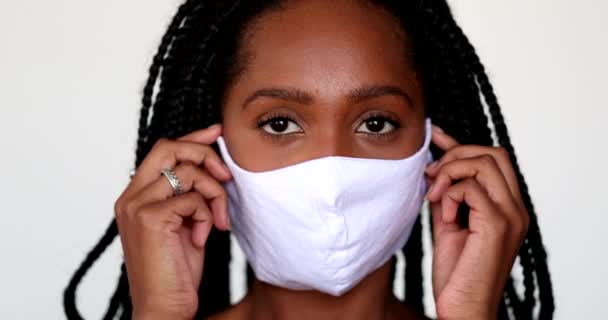 Black Girl Adjusting Covid Face Mask African Teen Wearing Mask — Stockvideo