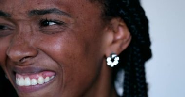 African black woman crying in despair. Depressed mood swings emotional sadness and laughing