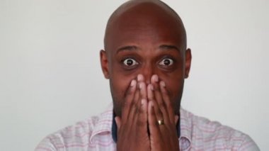 Casual black african man smiling and laughing portrait face