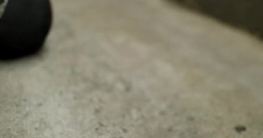 Kid playing ball with father