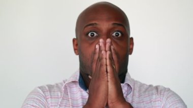 Mixed race shock reaction. Black African person reacting with unbelief