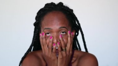 Anxious dramatic black woman in despair. African woman in frustration