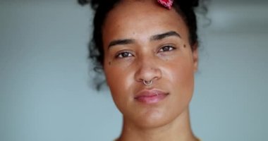 Young black African american woman close-up face portrait. Brazilian ethnically diverse girl