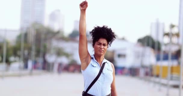 Female Political Activist Raising Fist Air — Stockvideo