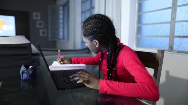 African Girl Taking Notes Doing Homework Study – stockvideo
