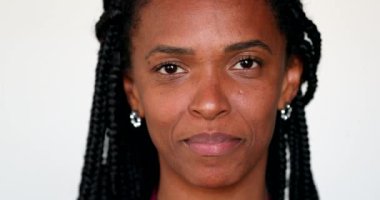 Portrait casual black African woman looking at camera smiling