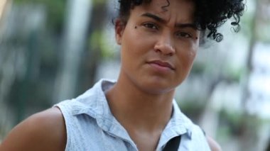 Mixed race woman saying STOP with hand