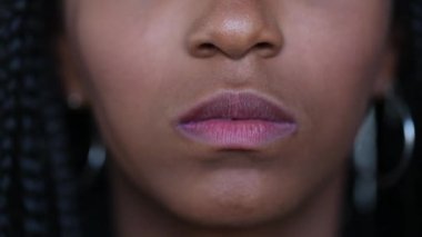 Black girl lips becoming serious, african woman changing emotion mood