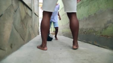 African father and child boy playing soccer
