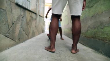 African father and child boy playing soccer