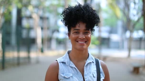 Millennial African Mixed Race Girl Standing Outdoors — Vídeos de Stock