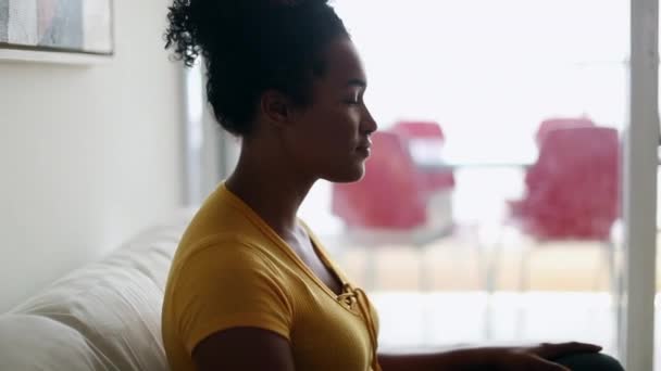 Young African Woman Sitting Home Sofa Meditation Contemplation — Αρχείο Βίντεο