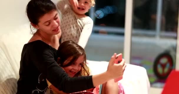 Candid Mother Kids Talking Cellphone Video Mom Holding Smartphone Multi — Stock Video