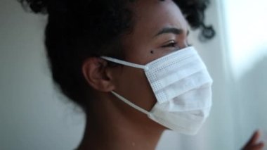 African american black woman wearing covid-19 mask during quarantine