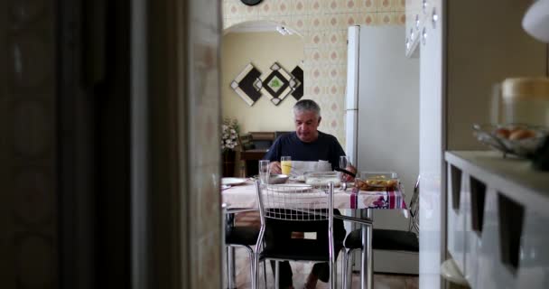 Older Man Home Taking Sip Orange Juice Senior Lunch Time — Video Stock