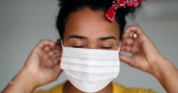 African American Woman Putting Covid Face Mask Prevention Disease — Stockvideo