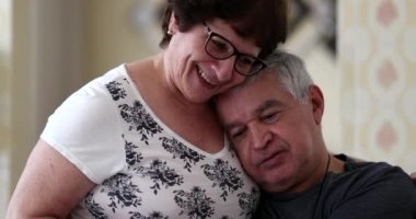 Loving senior married couple caring for each other. Older wife and husband love