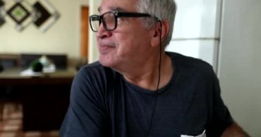 Older man getting up and celebrating success