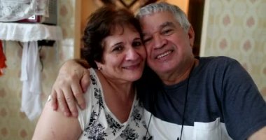 Older husband and wife hugging each other portraits