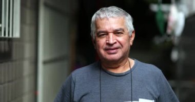 Casual older man laughing at camera. Senior smile feeling happy