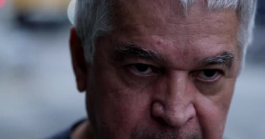 Old man raising head to sky with HOPE and FAITH