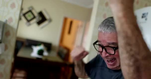 Older Man Celebrating Gesturing Hands Hugging Wife — Stok video