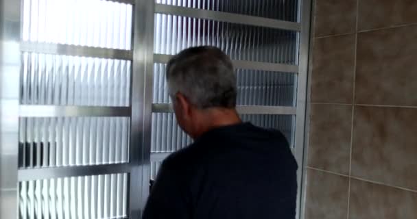 Old Man Arriving Home Opening Back Door Senior Opens Door — Stock video