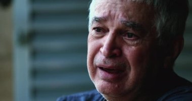 Sad depressed older man crying. Desperate senior person feeling guilt
