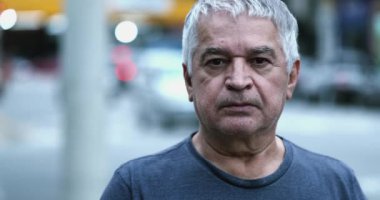 Senior person staring camera. Old middle-age man