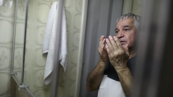 Faithful Religious Older Man Asking God Help Praying Front Bathroom — Stockvideo