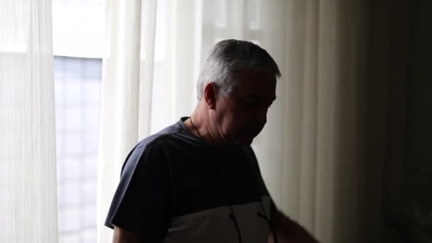 Pensive Older Man Standing Window Solitude — Stockvideo