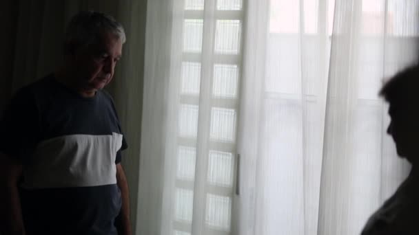 Depressed Older Couple Window Looking Shadows — Vídeo de Stock