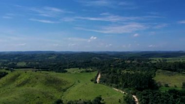 Aerial clouse nature landscape timelapse flying over countryside