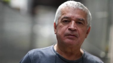 Senior man portrait, middle aged casual older person