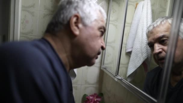 Sad Older Senior Person Suffering Front Bathroom Mirror — Stockvideo